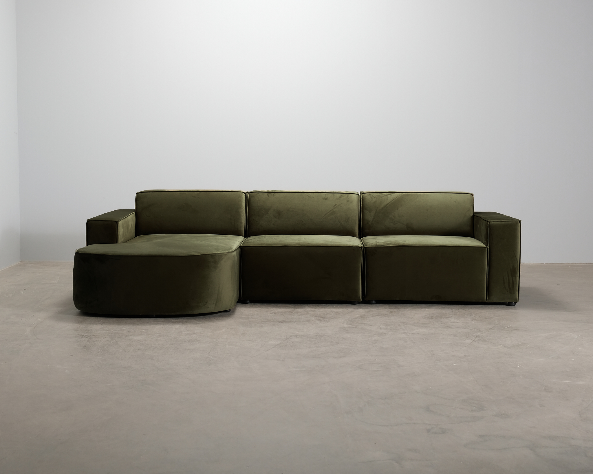 Micadoni Jodie 4-sits divansoffa mörkgrön