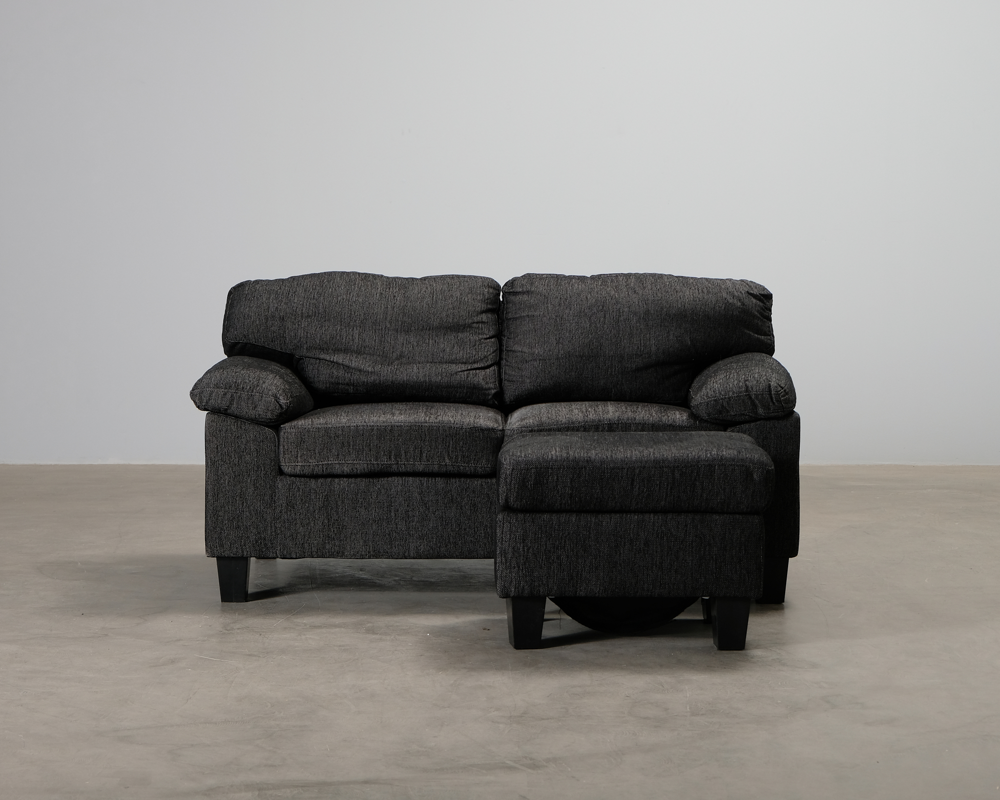 2-sits soffa med fotpall svart